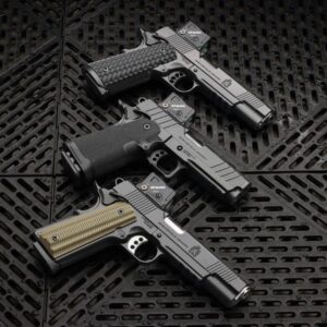 Three pistols on a grid pattern pad